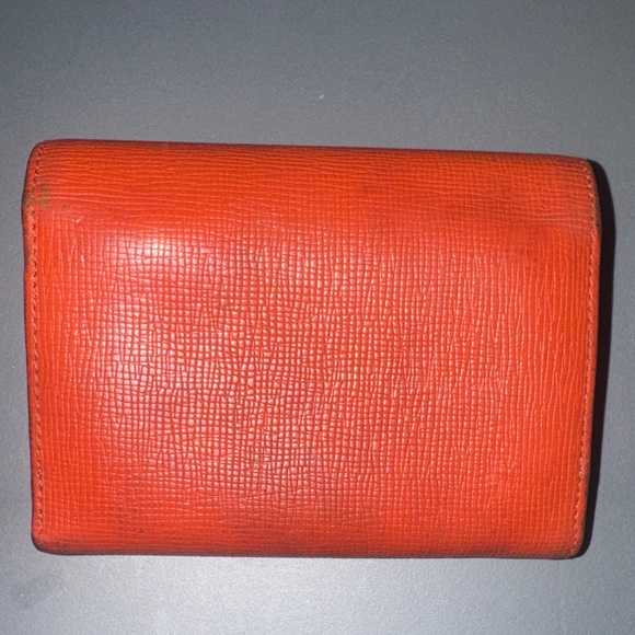 MCM Orange Leather Trifold Wallet with Gold Logo Accents - Picture 2 of 7